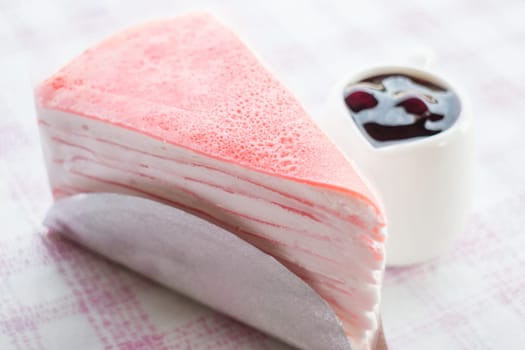 Set of delicious crepe cake with blueberry sauce, stock photo