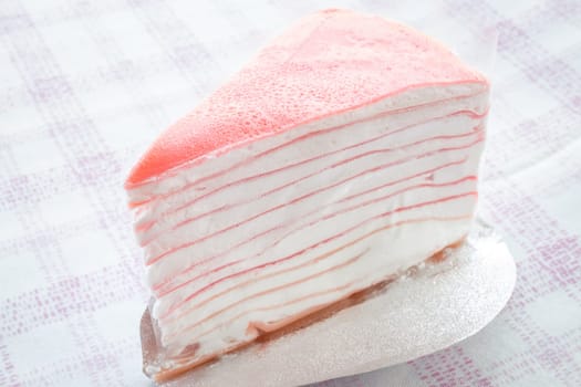 Close up delicious pink crepe cake, stock photo