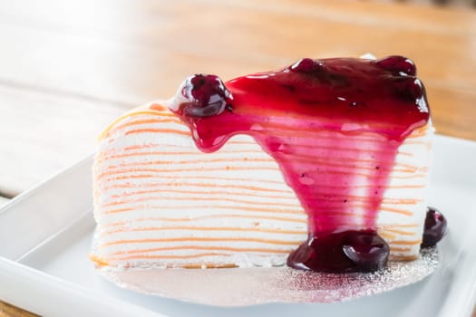 Homemade dessert blueberry crepe cake, stock photo