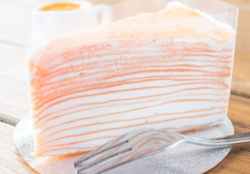 Homemade crepe cake with orange sauce, stock photo