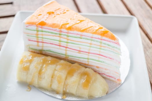 Whipped cream crepe cake with banana, stock photo