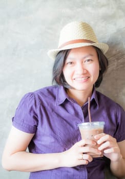 Asian woman smiling in coffee shop, stock photo