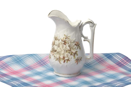 Old flower vase on cloth