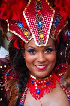 ROTTERDAM, THE NETHERLANDS - JULY 19, 2014, Carnival dancer at the street parade at the Summer Carnival in Rotterdam on July 19 in Rotterdam, The Netherlands.