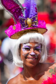 ROTTERDAM, THE NETHERLANDS - JULY 19, 2014, Carnival dancer at the street parade at the Summer Carnival in Rotterdam on July 19 in Rotterdam, The Netherlands.