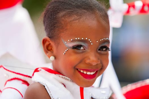 ROTTERDAM, THE NETHERLANDS - JULY 19, 2014, Young carnival dancer at the Summer Carnival street parade in Rotterdam on July 19 in Rotterdam, The Netherlands.