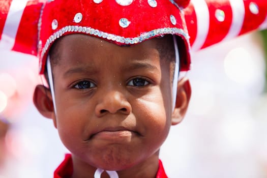 ROTTERDAM, THE NETHERLANDS - JULY 19, 2014, Young carnival dancer at the Summer Carnival street parade in Rotterdam on July 19 in Rotterdam, The Netherlands.