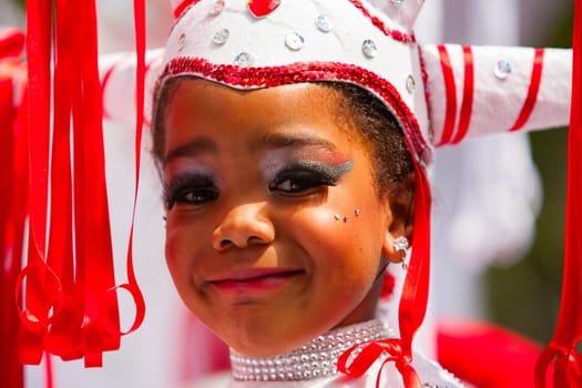 ROTTERDAM, THE NETHERLANDS - JULY 19, 2014, Young carnival dancer at the Summer Carnival street parade in Rotterdam on July 19 in Rotterdam, The Netherlands.