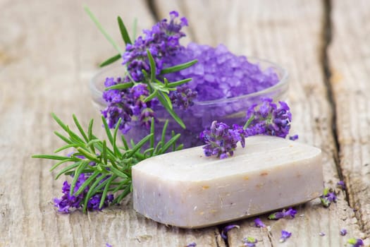 bar of natural soap, herbs and bath salt
