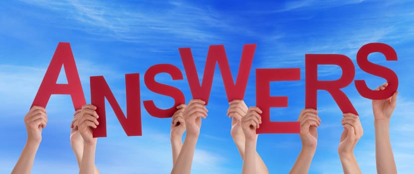 hands holding four pieces of a puzzle with copy space, gray background