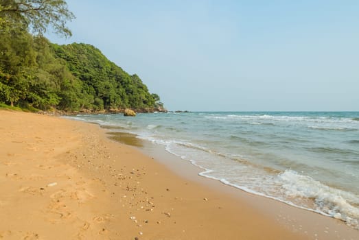 Tropical brown sand beach, Thailand