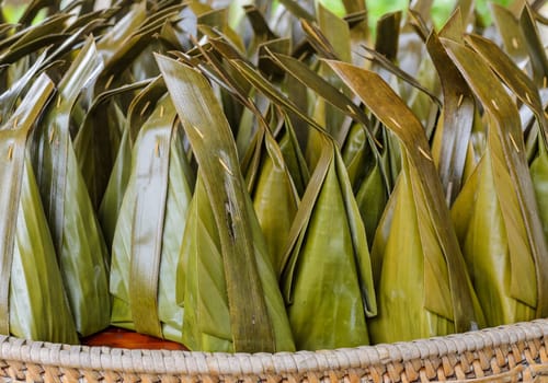 Thai sweet dessert wrapped in banana leaf