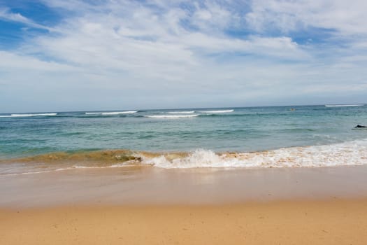 Beautiful secluded sandy beach in the Caribbean with white sand and blue sky as in paradise