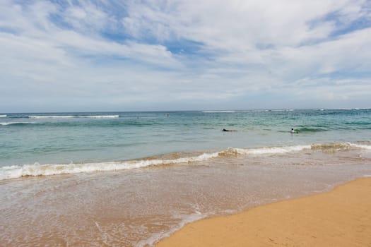 Beautiful secluded sandy beach in the Caribbean with white sand and blue sky as in paradise