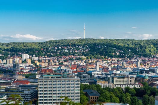 Picturesque view of Stuttgart Germany the modern skyscrapers under the traditional historical architecture overlooking the surrounding hills on a sunny day
