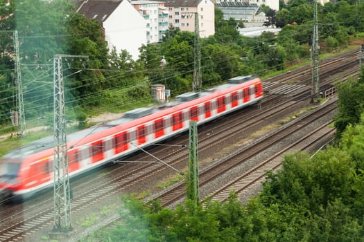 Train sbahn in motion on appeared outdoors in daylight