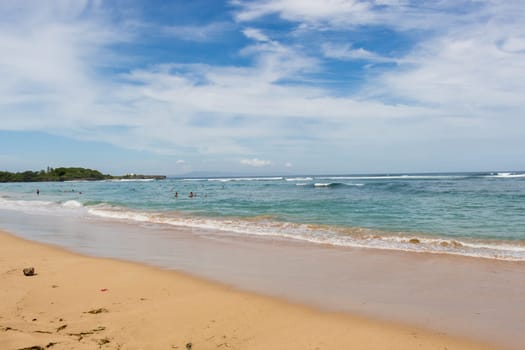 Beautiful secluded sandy beach in the Caribbean with white sand and blue sky as in paradise
