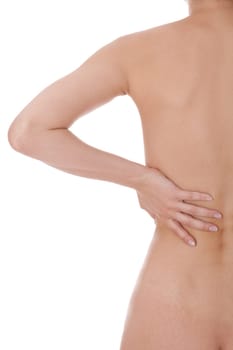 Young attractive woman grabs with her hands on her back bodypart isolated voe white background
