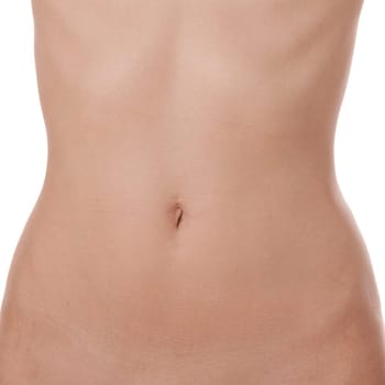 Close-up of a female abdomen from the hip to the chest isolated against a white background