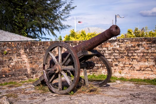 large ancient antique cannon made of cast iron historical war weapons