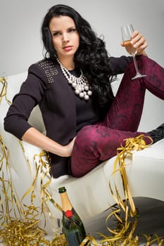 elegant attractive young woman with champagne and air snakes party outfit fashion celebration
