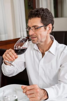 Young couple group in a restaurant cheerful while drinking