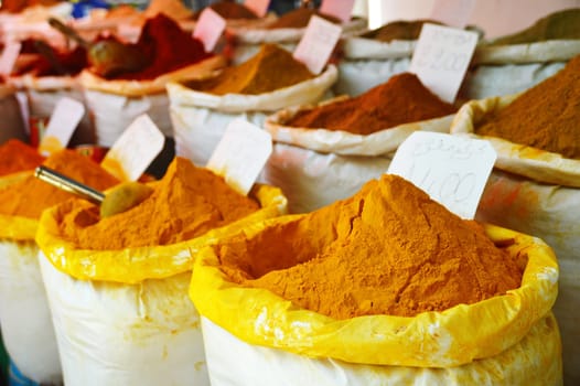 Spices in Arabic store including turmeric and curry powder