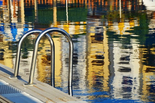Swimming pool in touristic resort during summer time