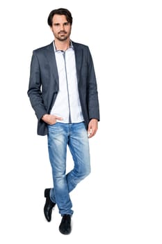 Self-proclaimed man in casual clothes with dark hair and beard isolated against a white background