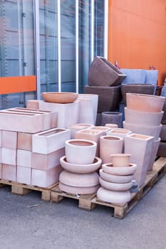Flower pots made of stone Glazed and unglazed in retail outdoors