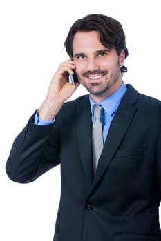 Young businessman with smartphone with dark hair and beard isolated against white background