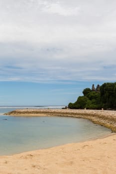 Beautiful secluded sandy beach in the Caribbean with white sand and blue sky as in paradise