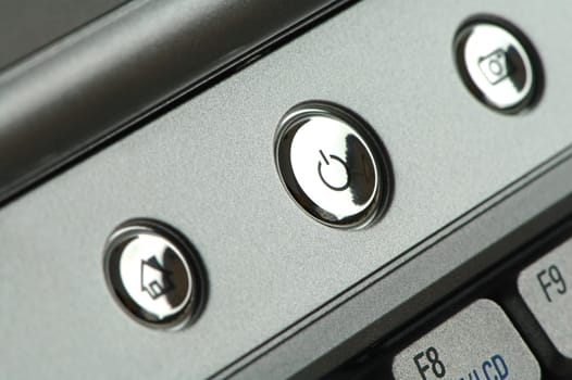 The close up shot of set of buttons of a notebook