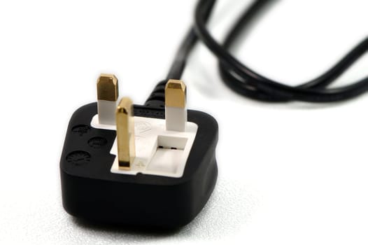 A close up view of electrical plug on white