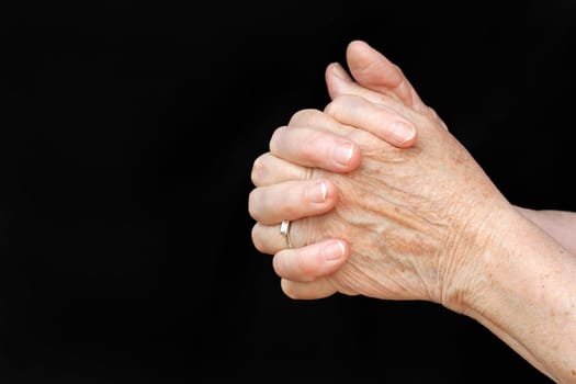 A praying old woman