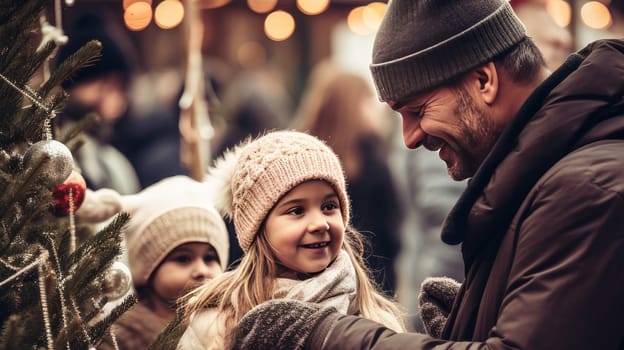 Happy father and children walk near the Christmas tree. Merry Christmas and Merry New Year concept