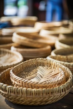 Woman weaving wicker basket indoors, closeup view. AI Generated