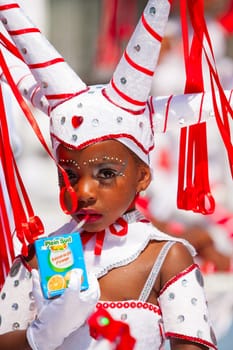 Rotterdam, the Netherlands - July 19, 2014, Young carnival dancer in the parade at the Caribbean Carnival in Rotterdam on July 19 in Rotterdam, The Netherlands.