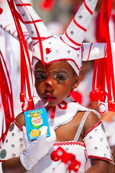 Rotterdam, the Netherlands - July 19, 2014, Young carnival dancer in the parade at the Caribbean Carnival in Rotterdam on July 19 in Rotterdam, The Netherlands.