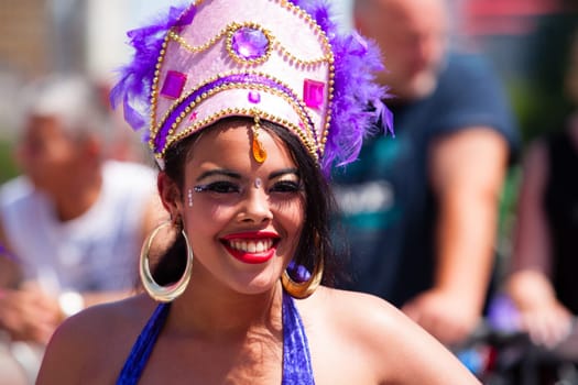 ROTTERDAM, THE NETHERLANDS - JULY 19, 2014, Carnival dancer in the parade at the Caribbean Carnival in Rotterdam on July 19 in Rotterdam, The Netherlands.