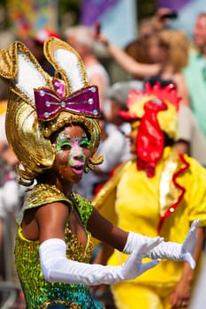 ROTTERDAM, THE NETHERLANDS - JULY 19, 2014, Carnival dancer at the Caribbean Carnival street parade on July 19 in Rotterdam, The Netherlands.