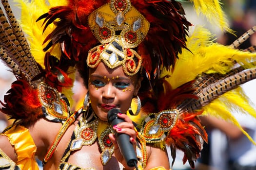 ROTTERDAM, THE NETHERLANDS - JULY 19, 2014, Carnival dancer at the Caribbean Carnival street parade on July 19 in Rotterdam, The Netherlands.