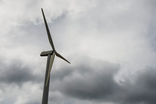 The turbine wind in the field for electricity.