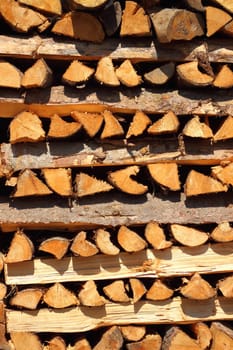 Close up on vertical placed pile of fire wood in vertical