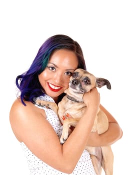 A closeup portrait picture of a Asian woman holding her dog to her face,.smiling, isolated on white background...