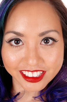 A closeup picture of a beautiful Asian's woman's face with big eye's .and red lips..