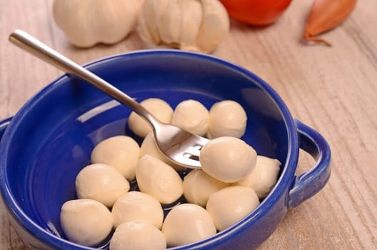 Mozzarella with cooking ingredients