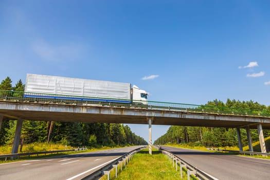 Truck on the bridge over highway