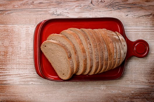Wheat bread on an old ceramic plate