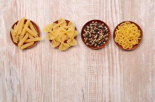 Pasta ingredients on a wooden table